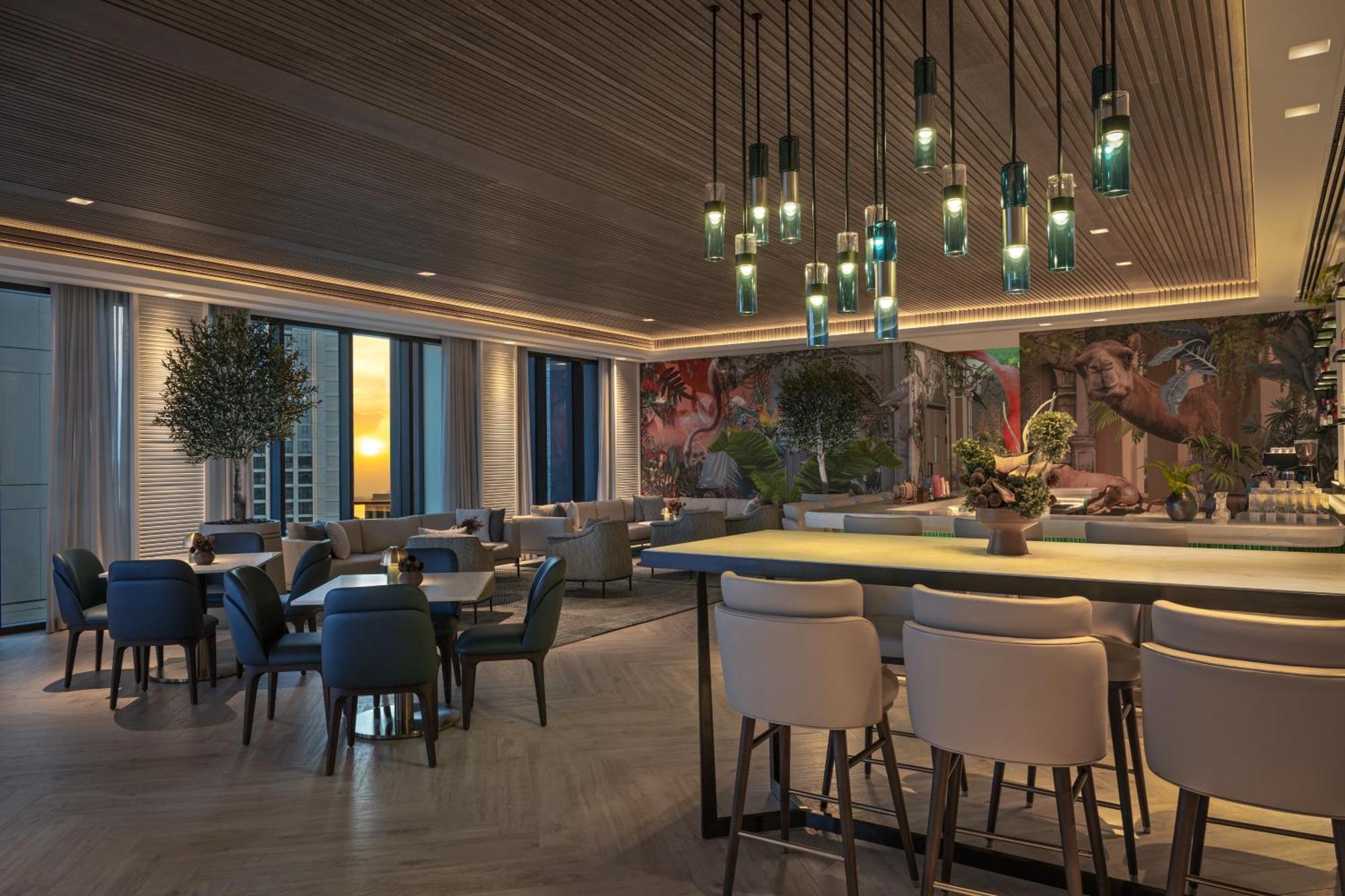 Palace Dubai Creek Harbour Extérieur photo The Lounge at the airport