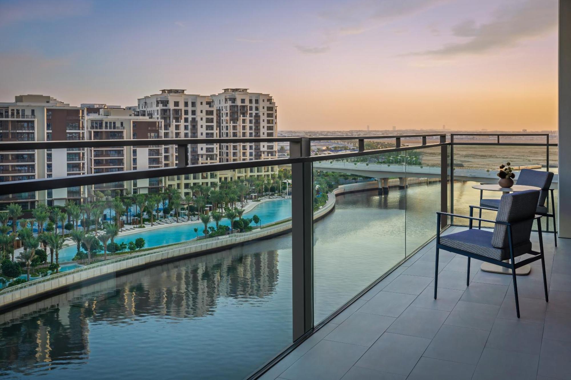 Palace Dubai Creek Harbour Extérieur photo View of the canal from a balcony