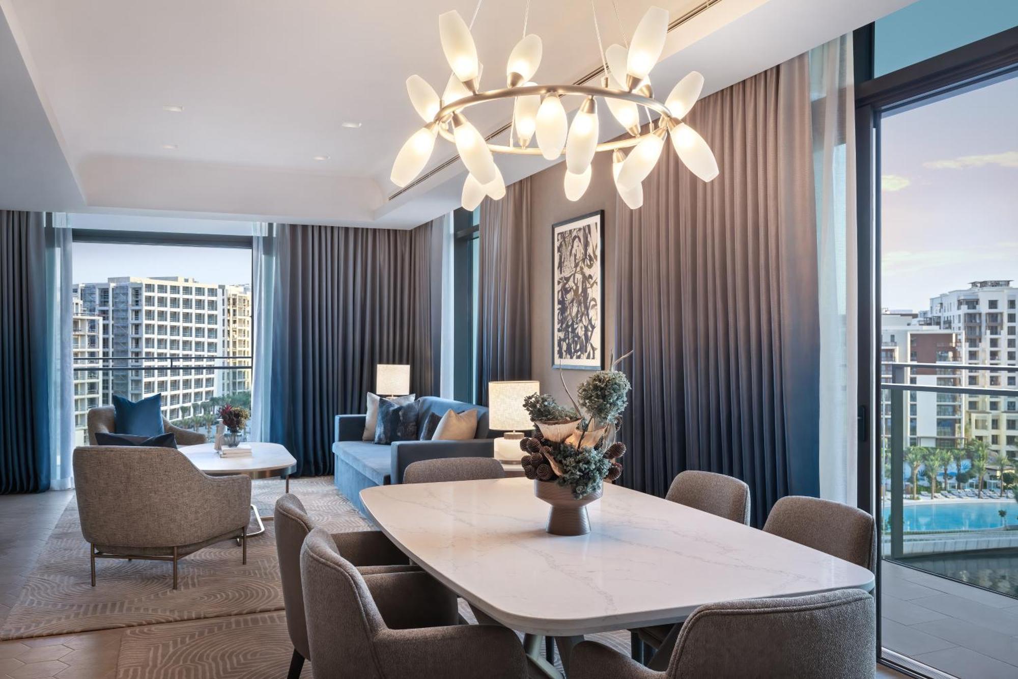 Palace Dubai Creek Harbour Extérieur photo A living room at the Ritz-Carlton, DIFC